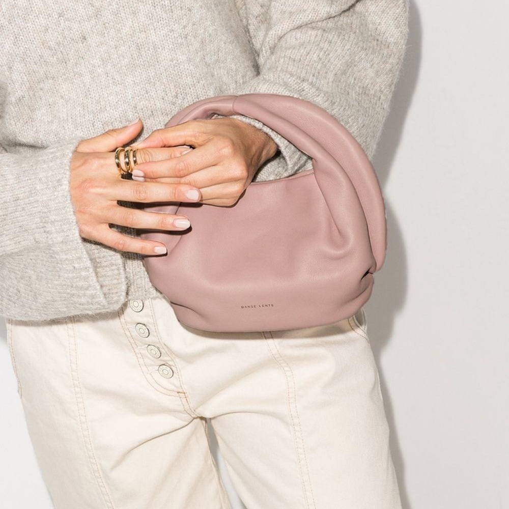 Danse Lente mini Lola crescent leather bag in peach nude. Dust bag included